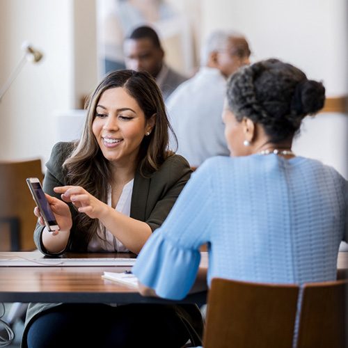 Staff member helping employee